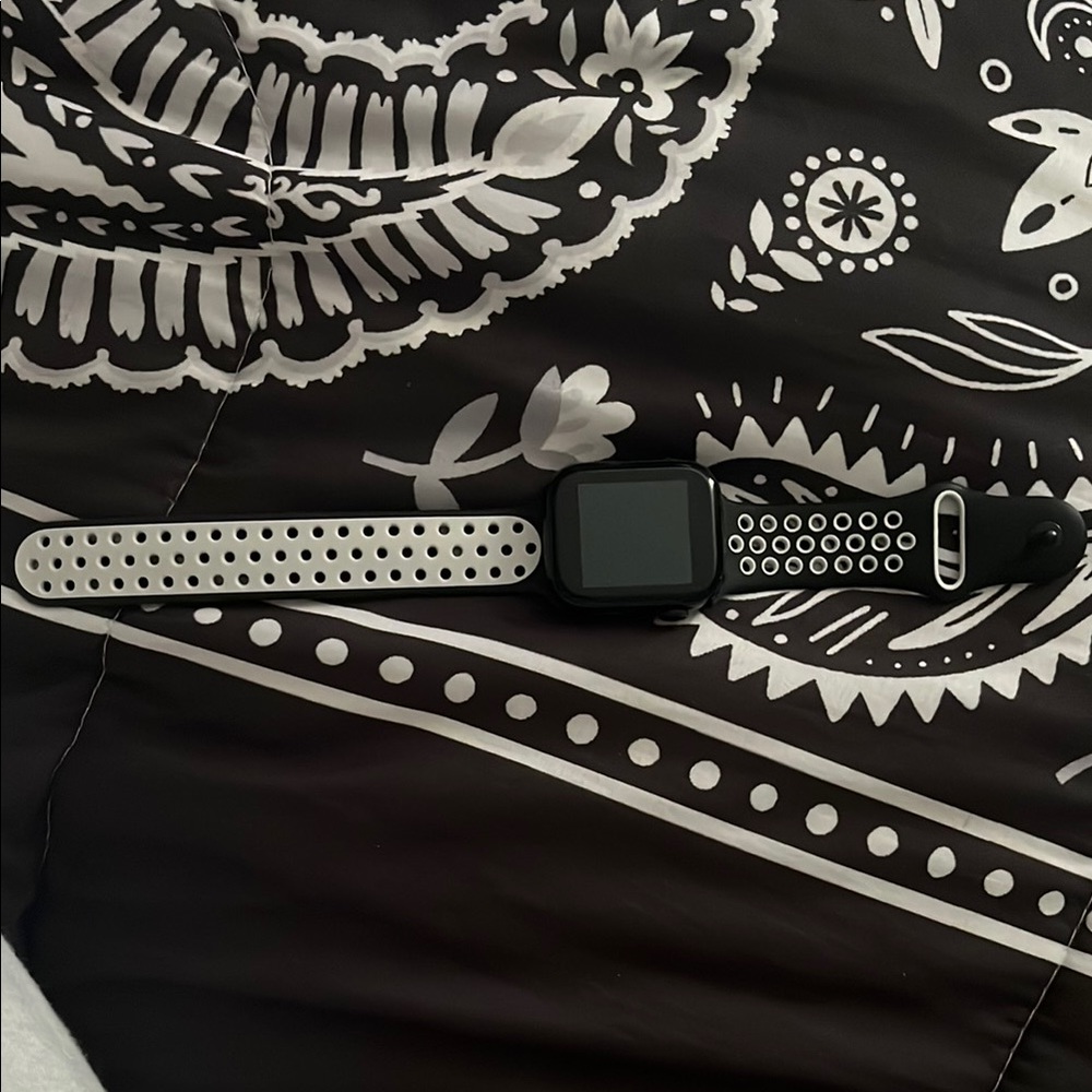Black and White Smartwatch with Perforated Strap